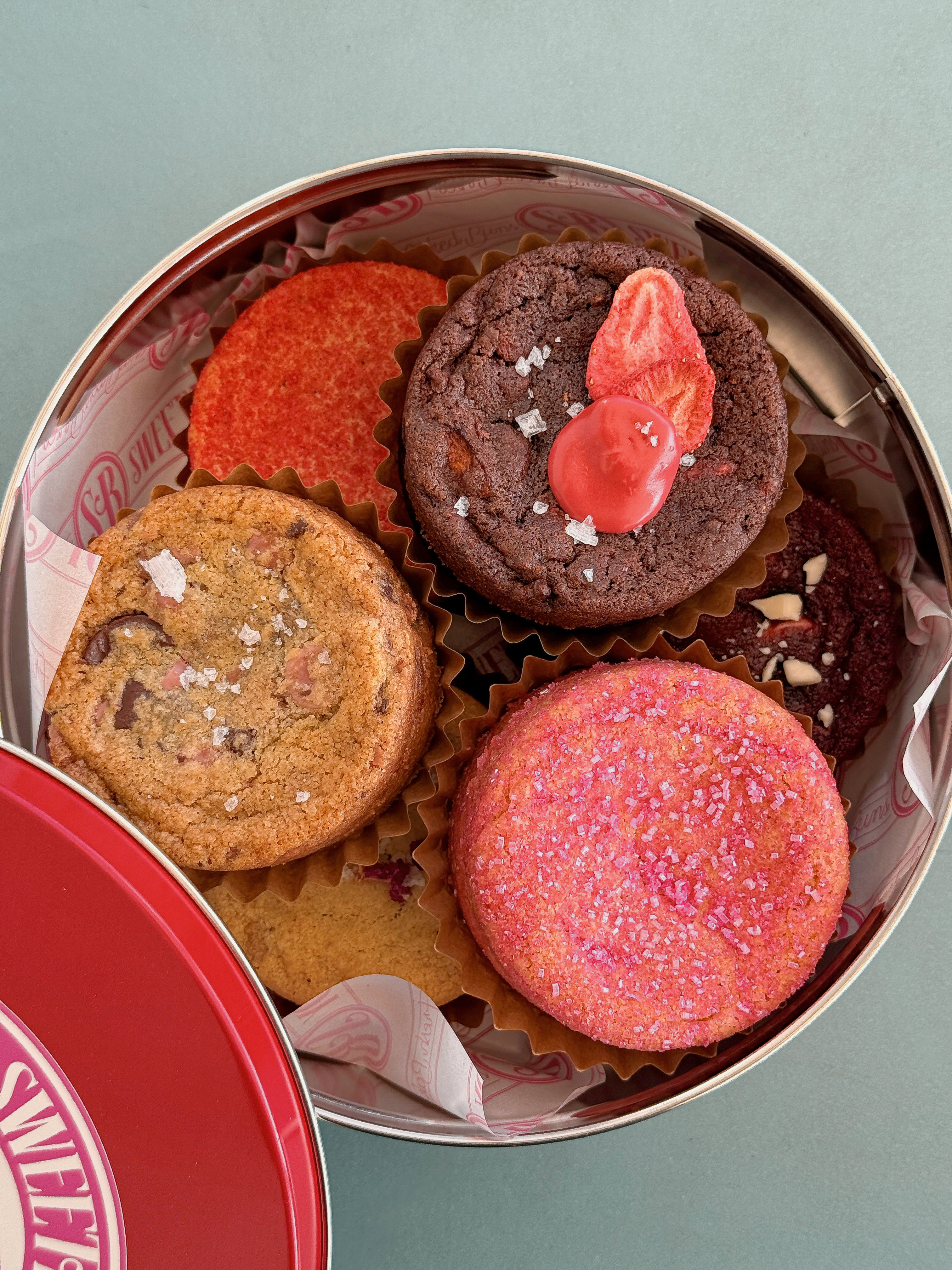 top down photo of cookies in a red tin