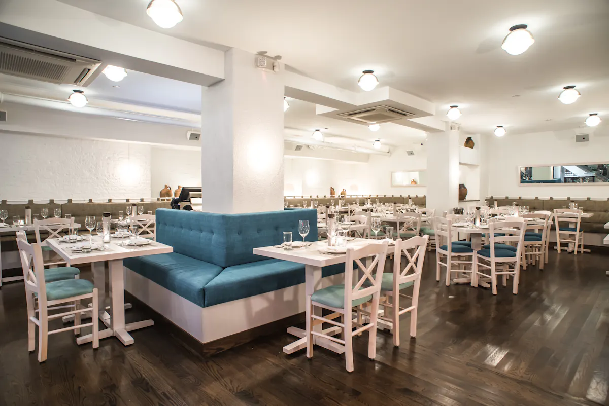 a room filled with furniture and a table