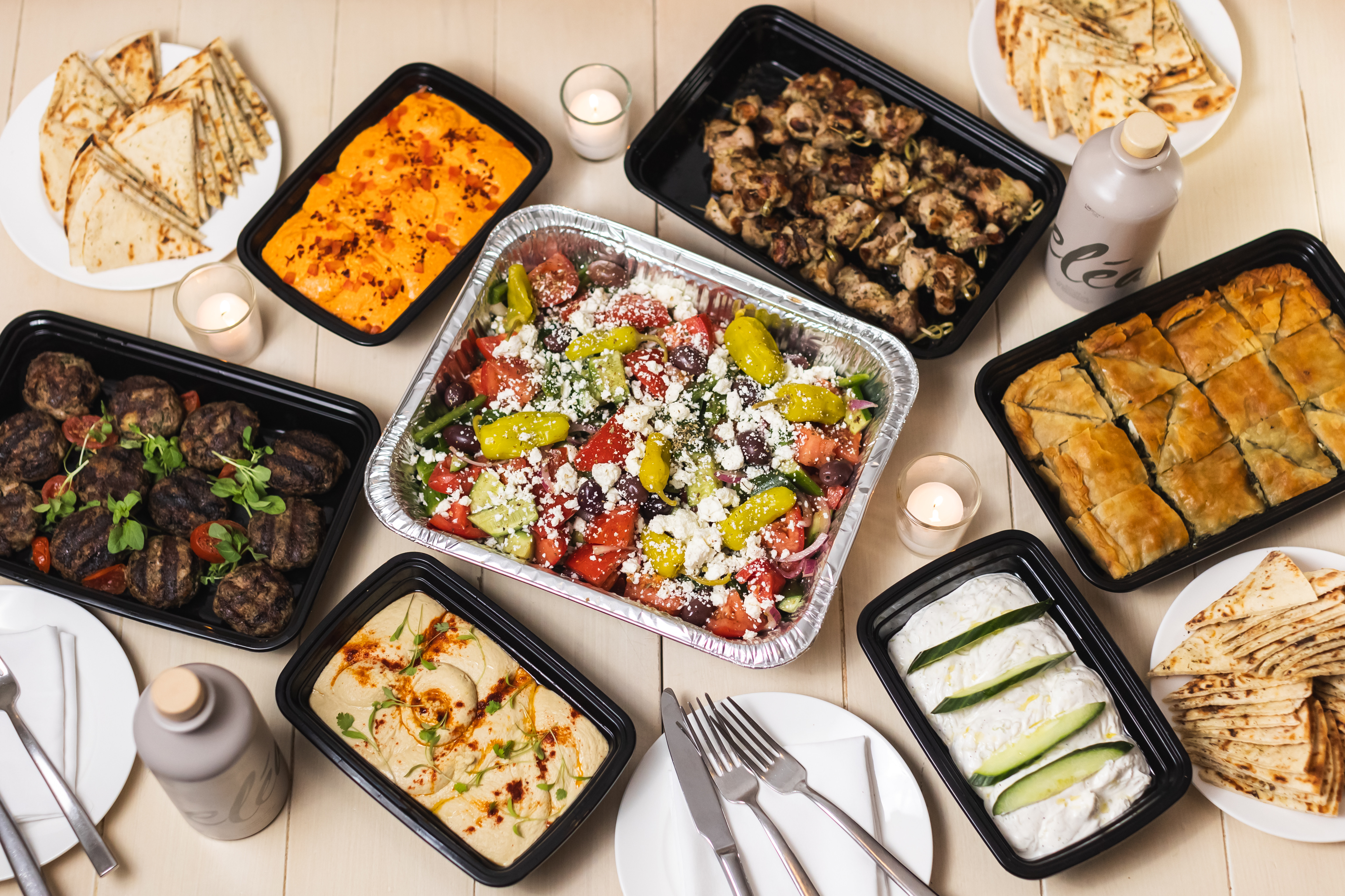 a table with trays of food