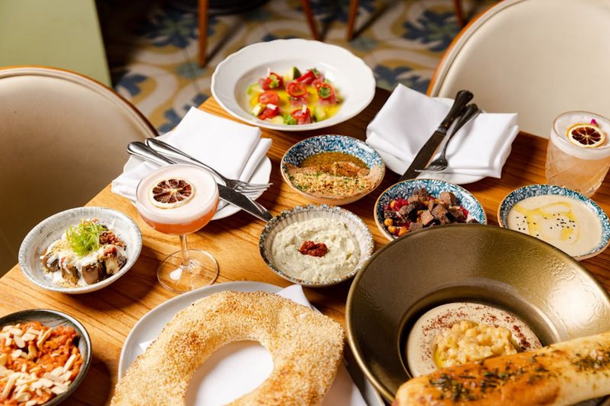 a bowl filled with different types of food on a plate