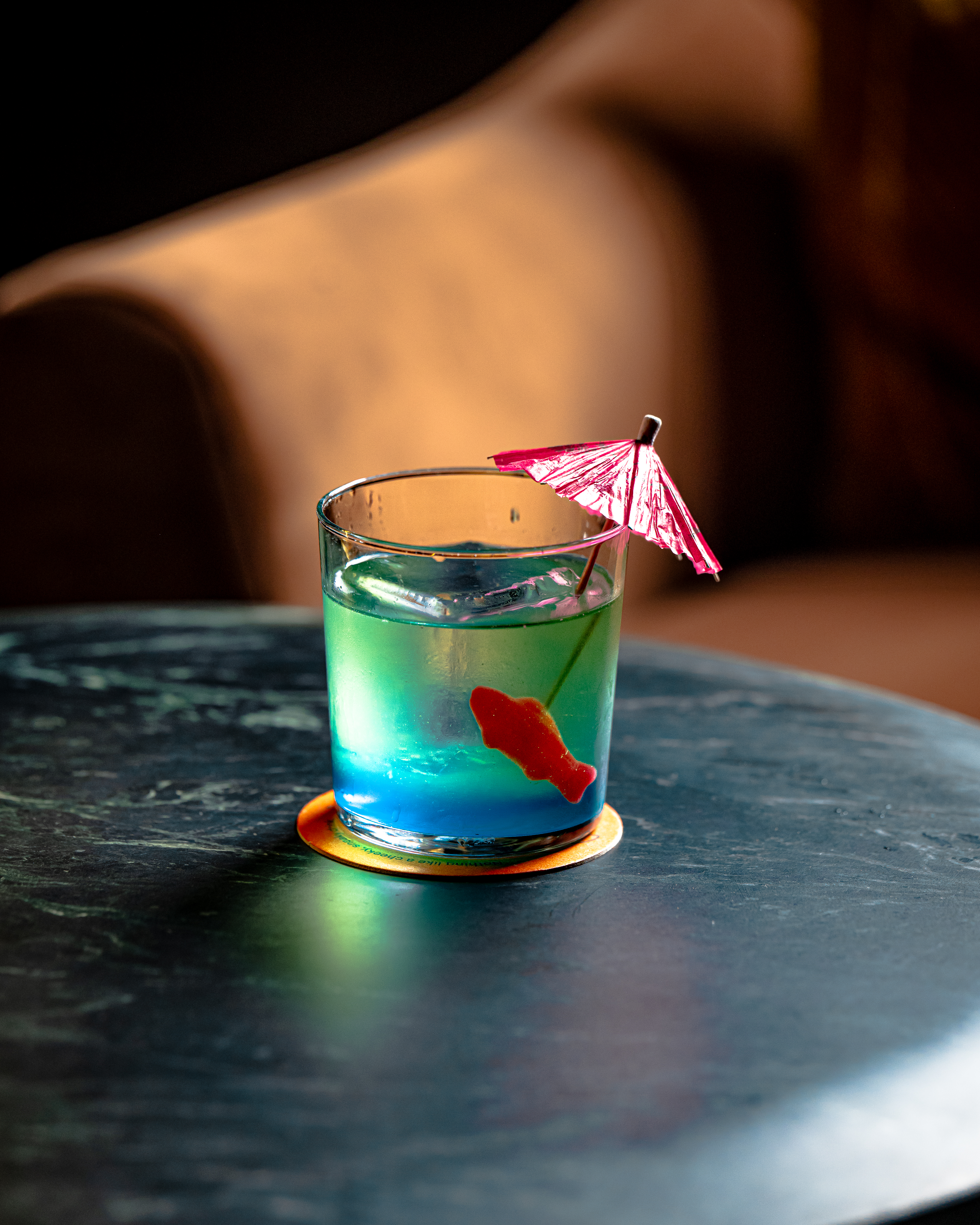 a close up of a coffee cup sitting on a table
