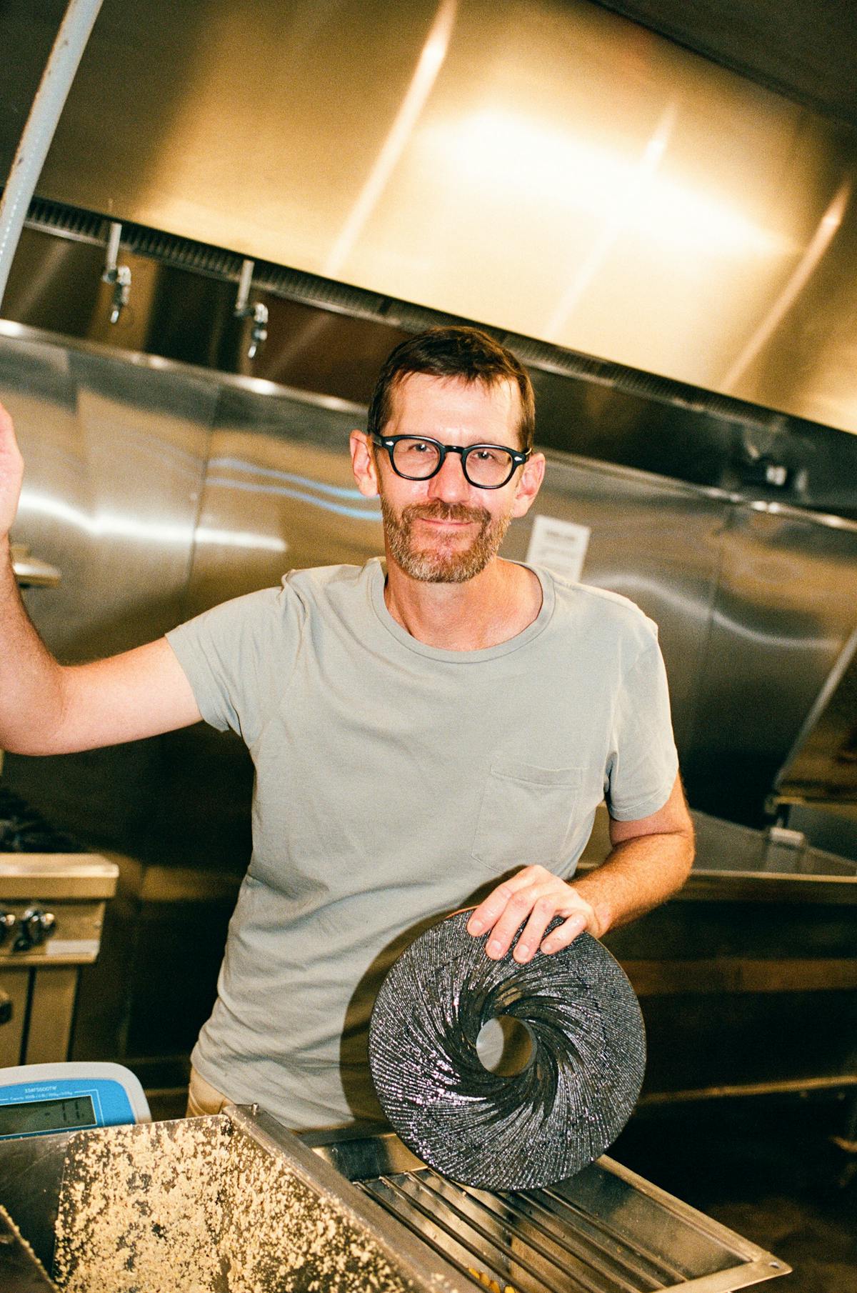 a man cooking in a kitchen