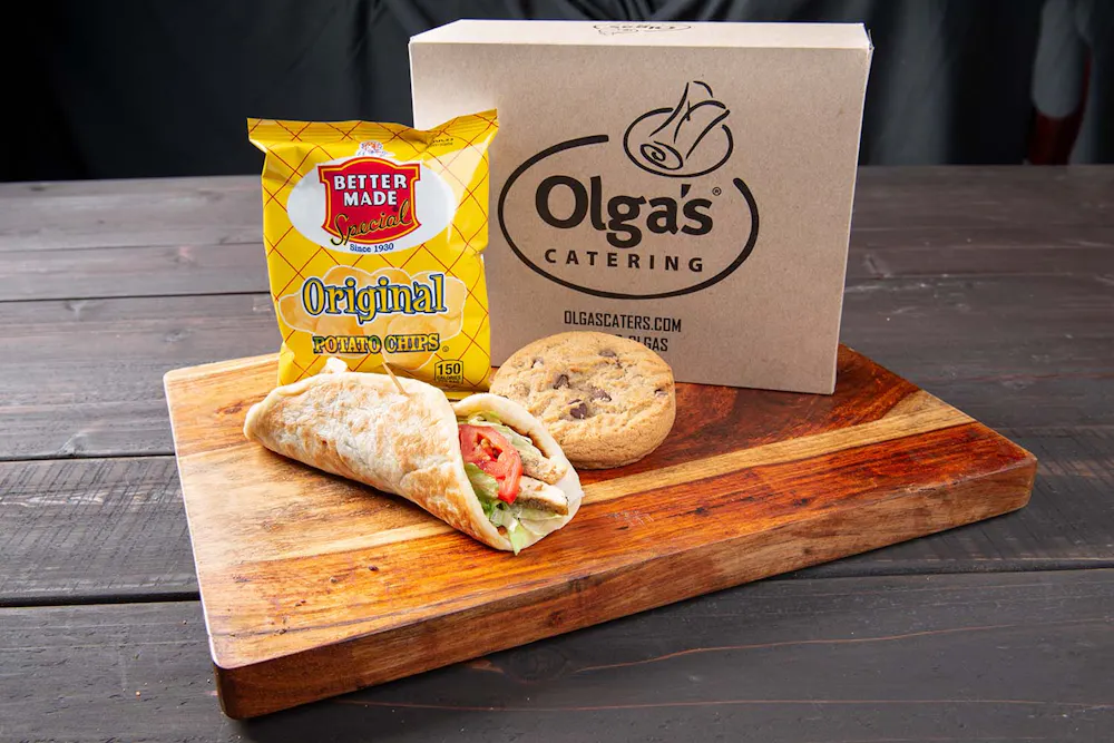 a sandwich sitting on top of a wooden table