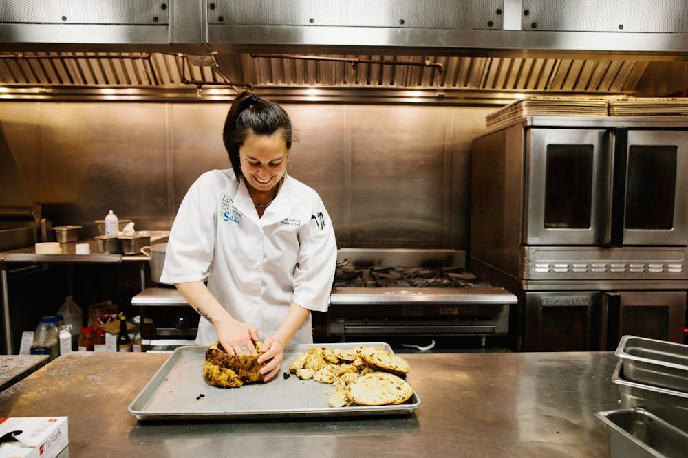 a person preparing food in a kitchen