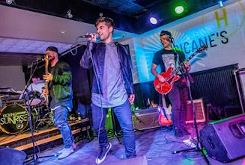 a group of people standing on a stage