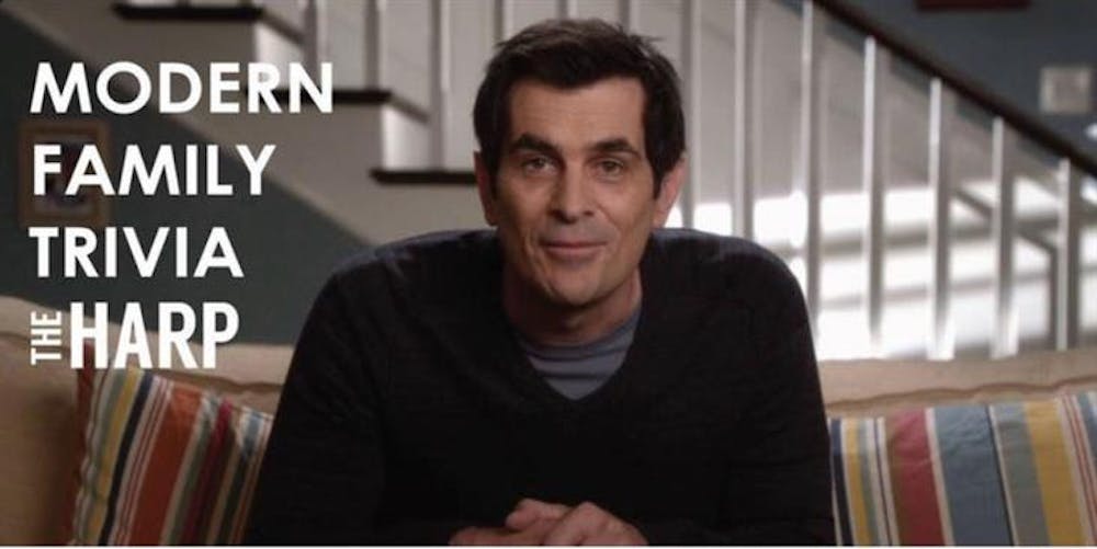 Ty Burrell sitting at a table