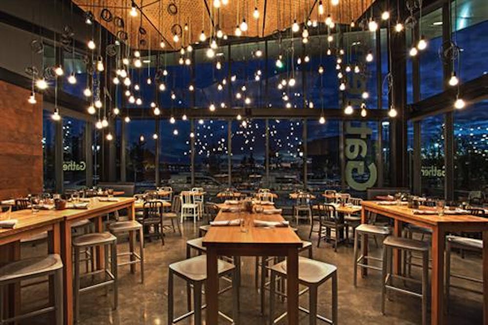 a dining room table in front of a building