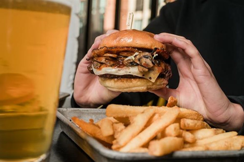 a sandwich and fries on a table