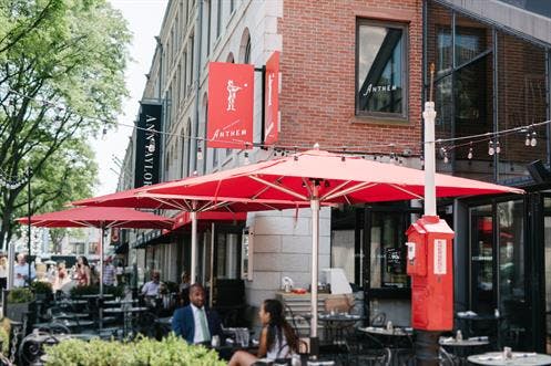 a group of people standing in front of a building