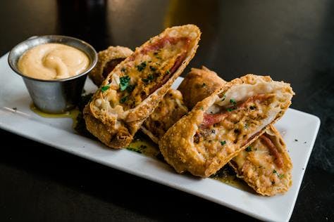a plate of food and a cup of coffee