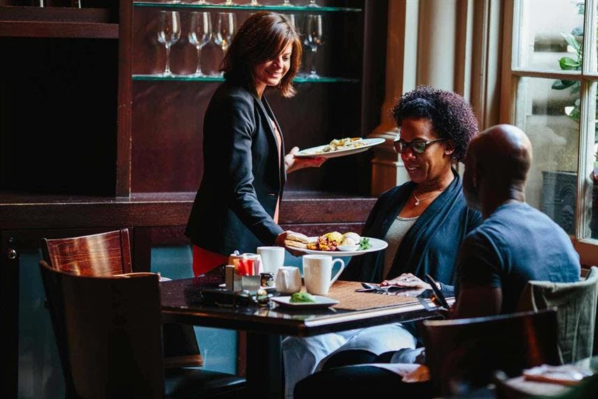 a man and a woman sitting at a table