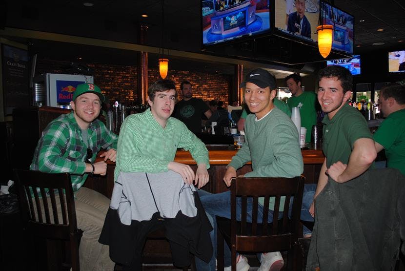 a group of people sitting at a table