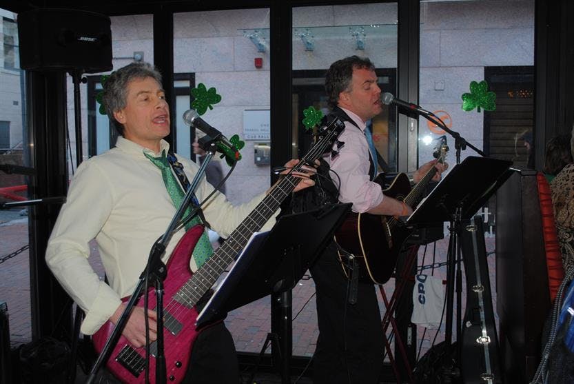 a man and a woman holding a microphone