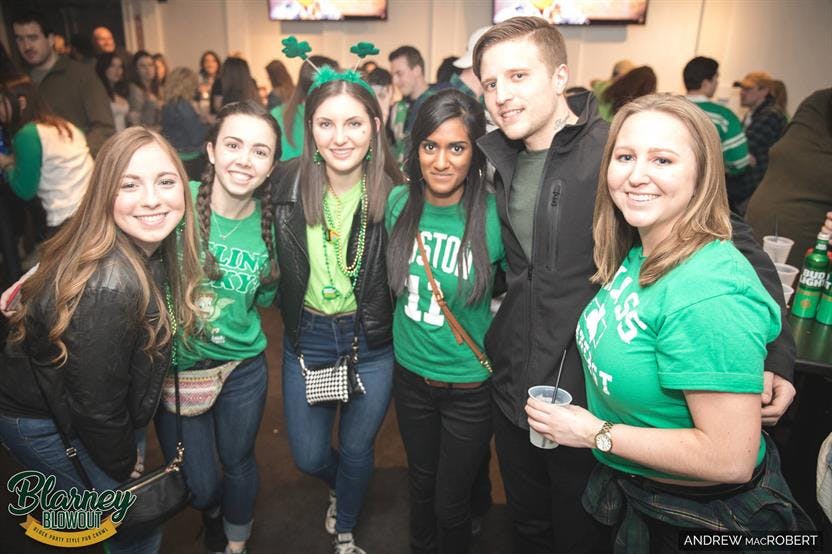 a group of people posing for the camera