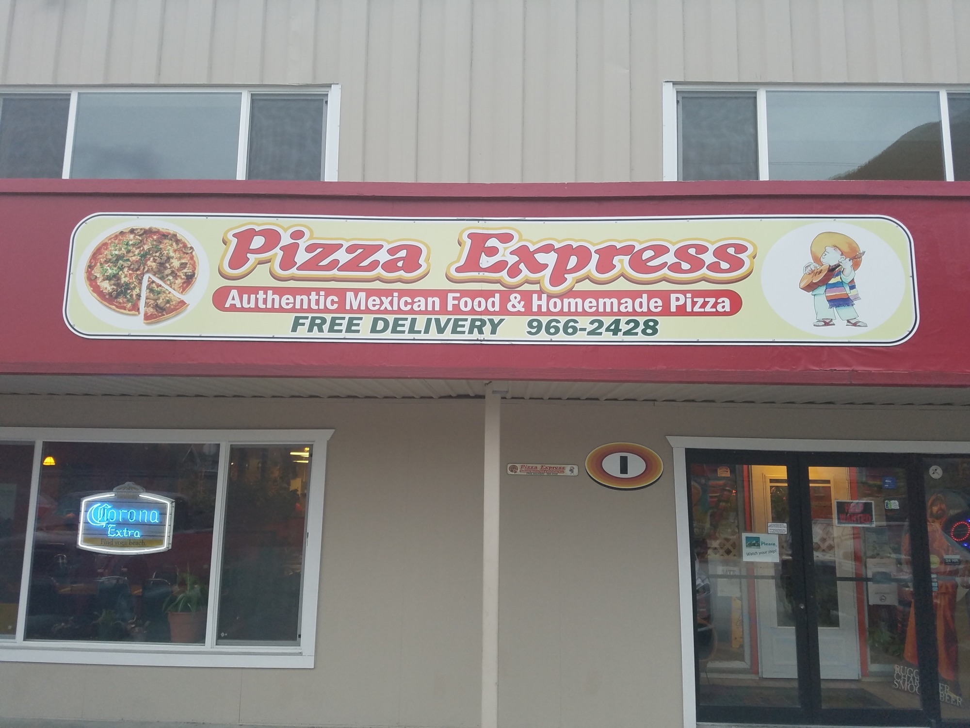 Exterior photo of Pizza Express with the logo banner on top 