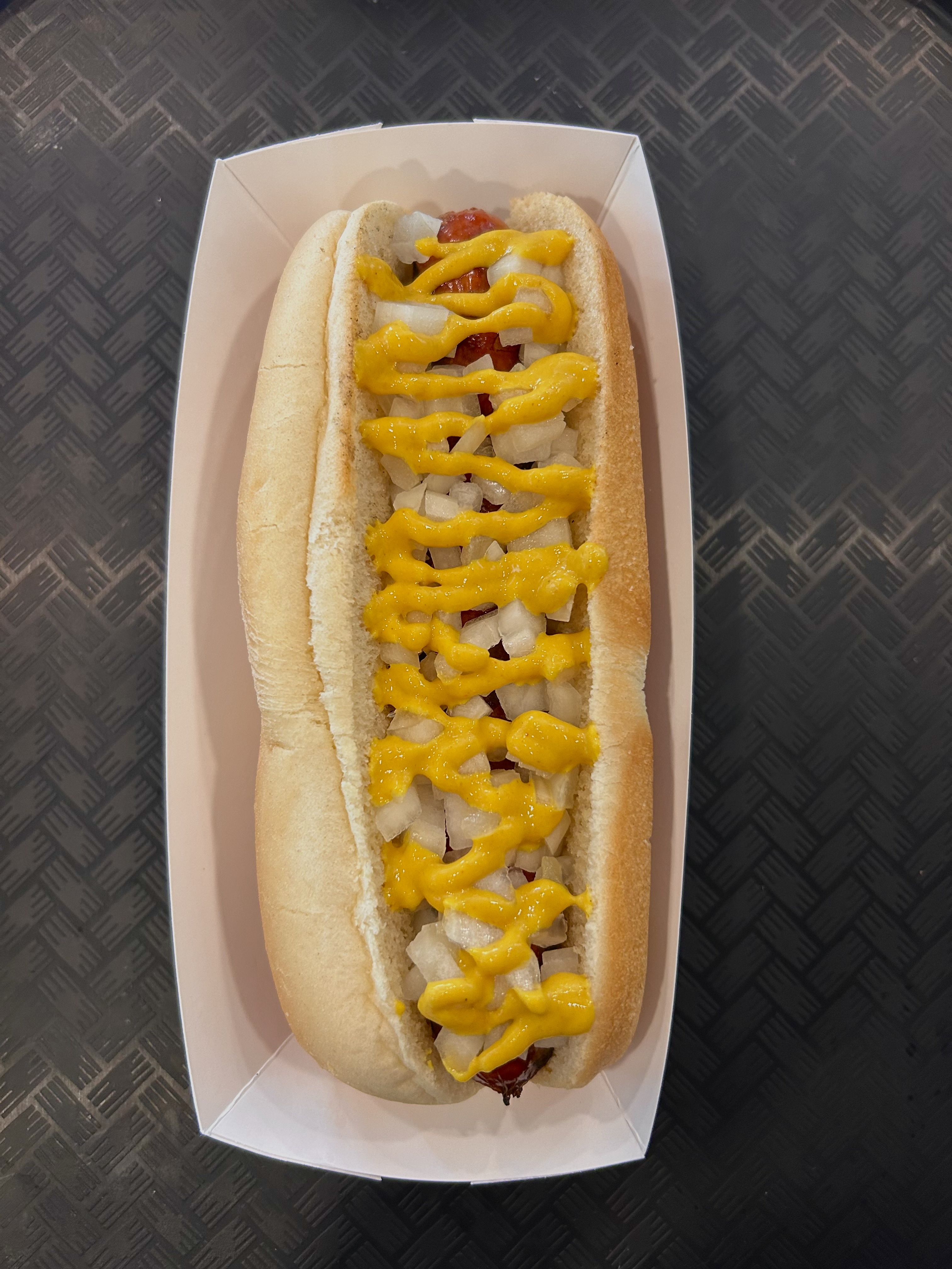 a hot dog on a bun