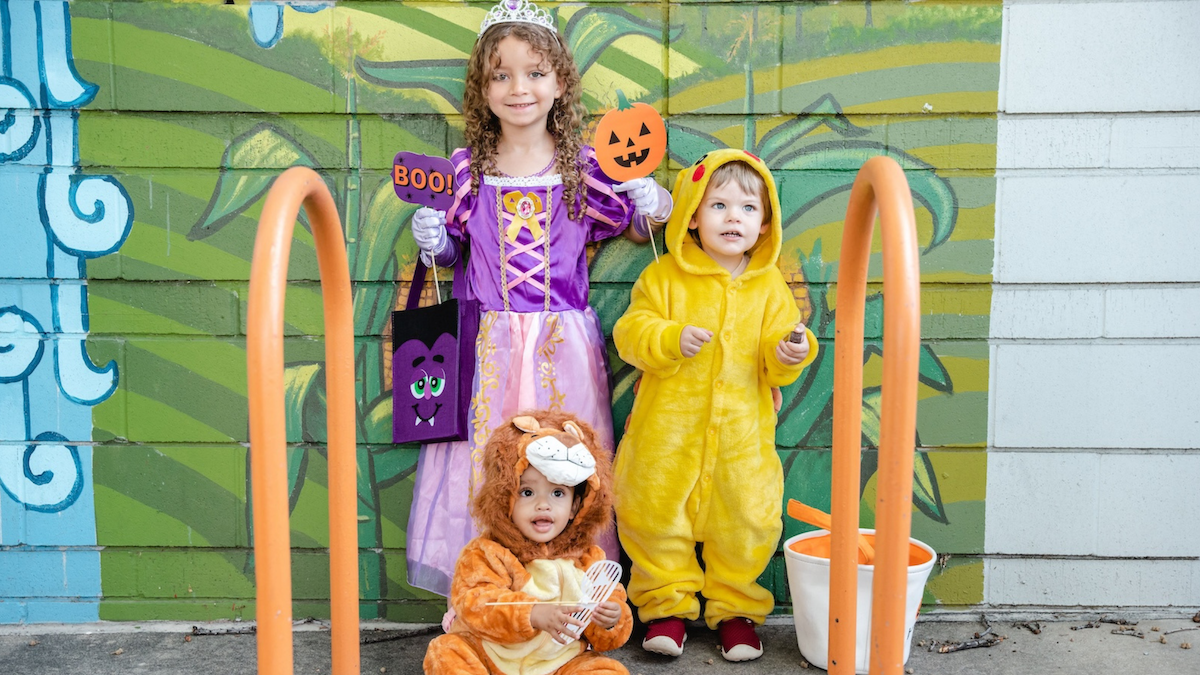 a little girl posing for a picture