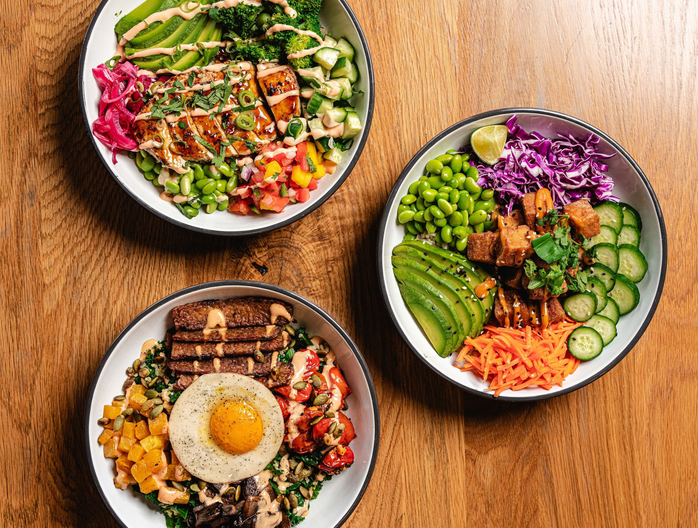 a bowl filled with different types of food on a table