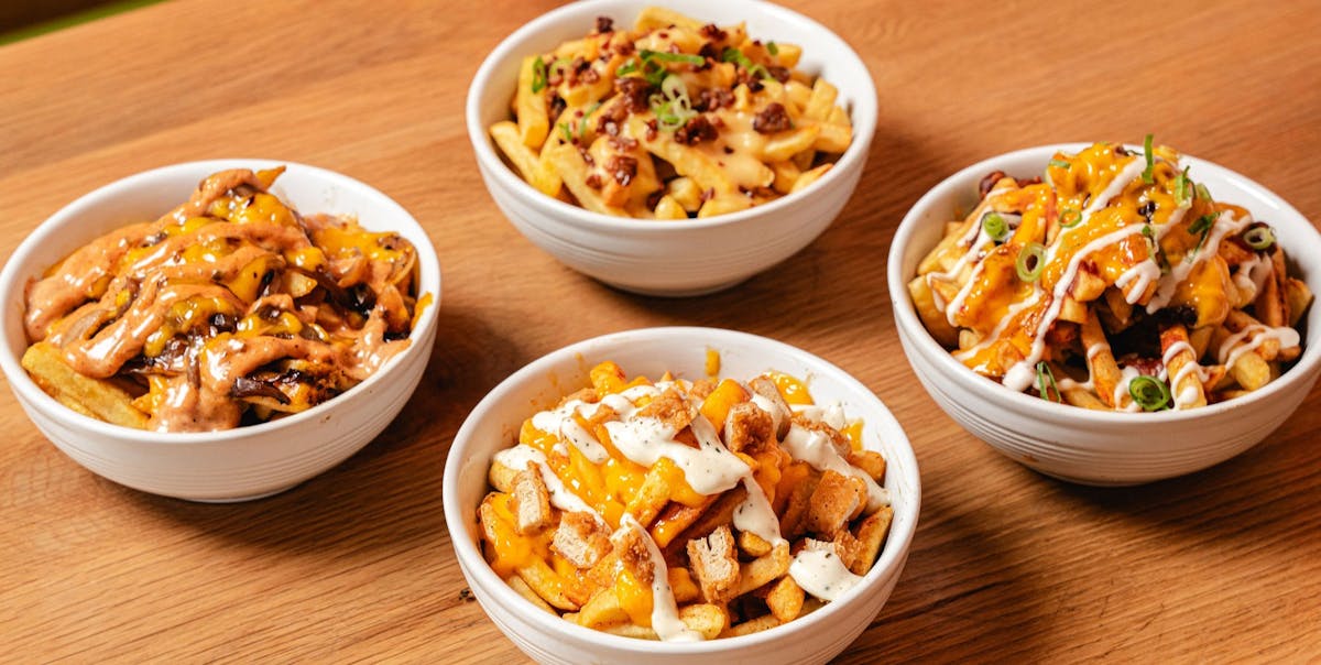 a bowl filled with different types of food on a table