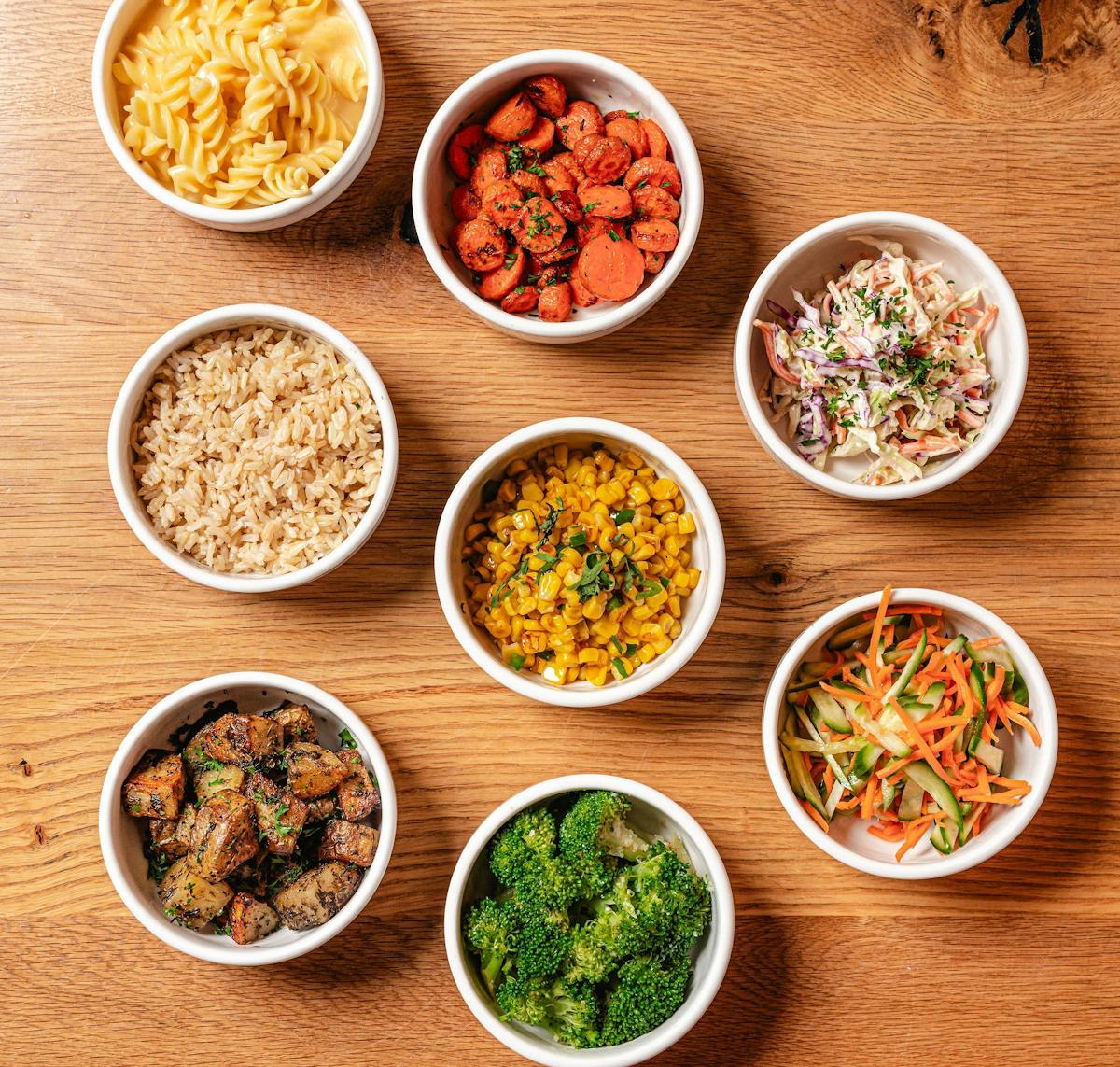 a bowl filled with different types of food on a table
