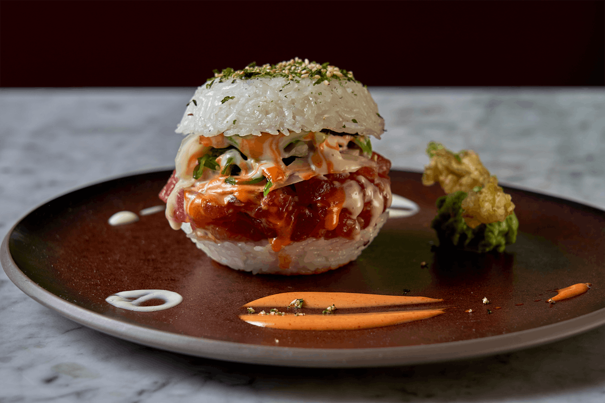 a sandwich sitting on top of a plate of food