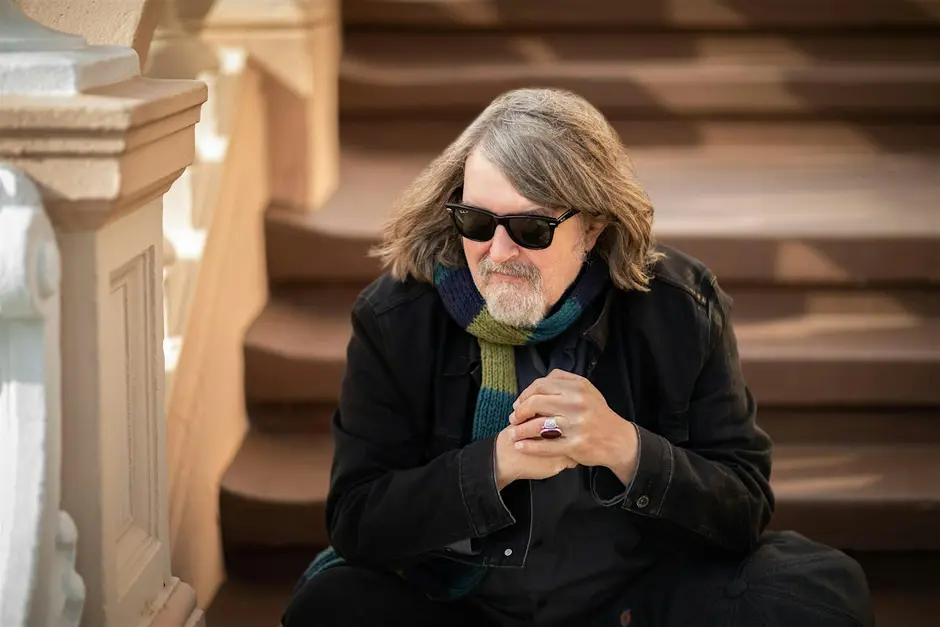a man sitting on stairs