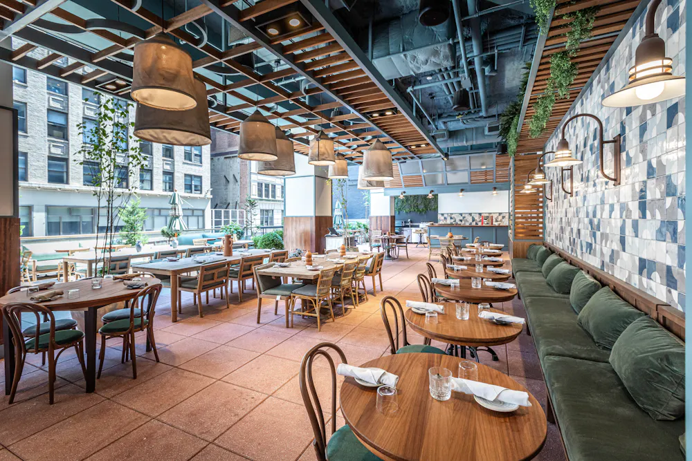 a dining room table in front of a building