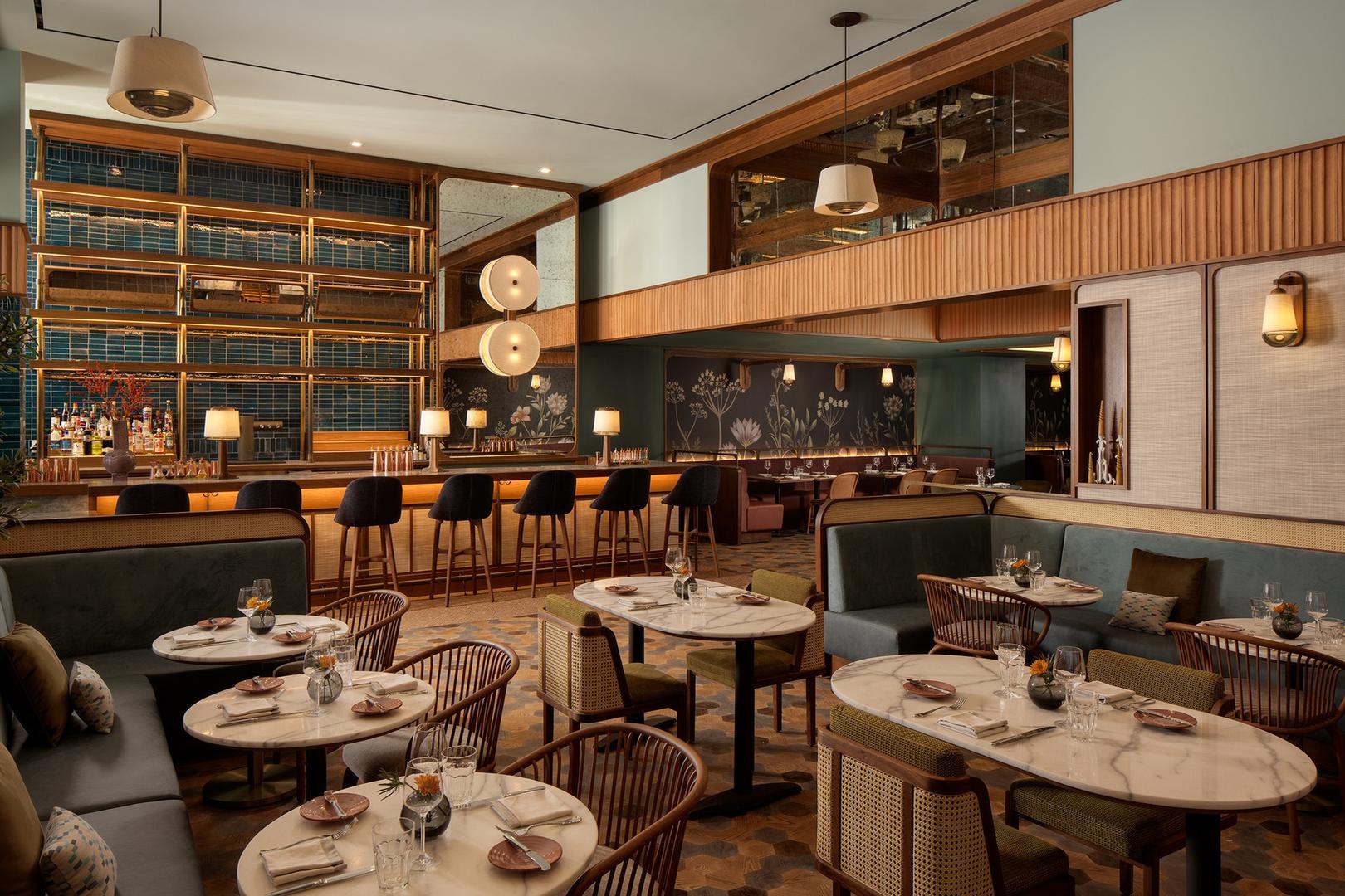 a restaurant with tables and chairs