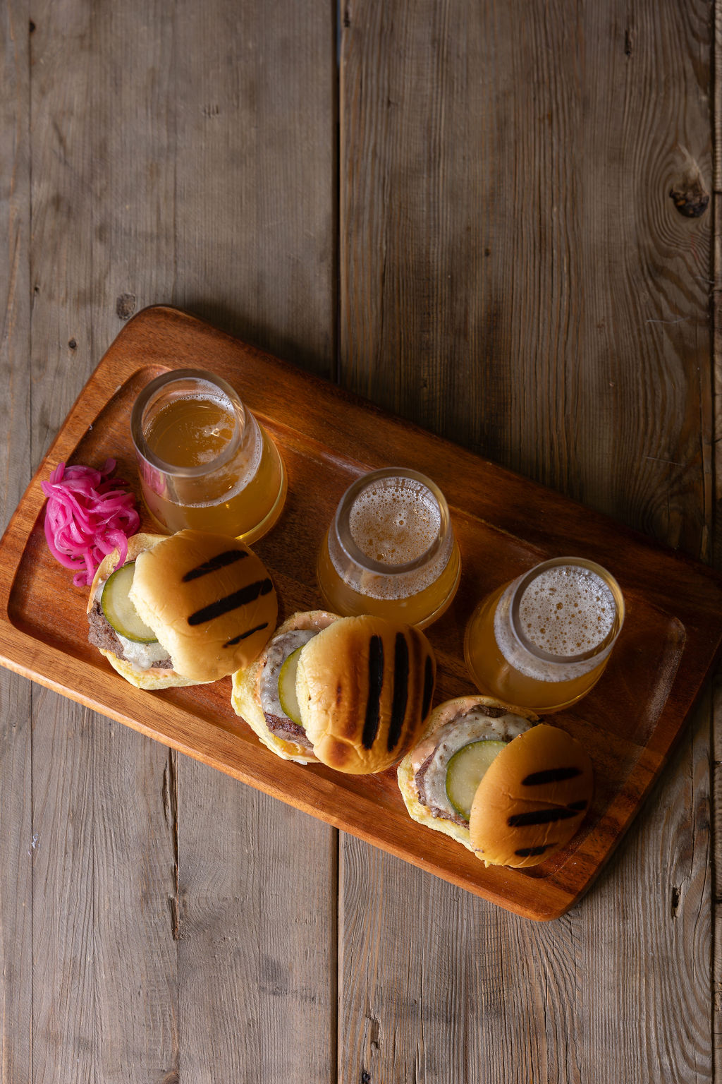 a group of shoes on a wooden table