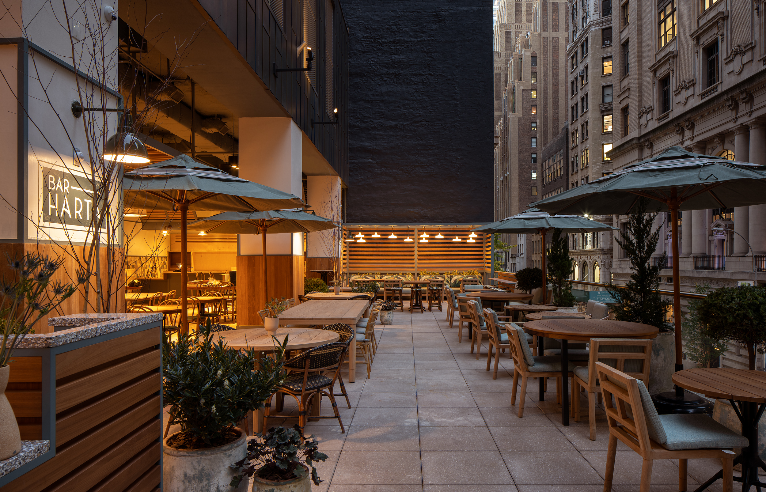 a wooden bench in front of a building
