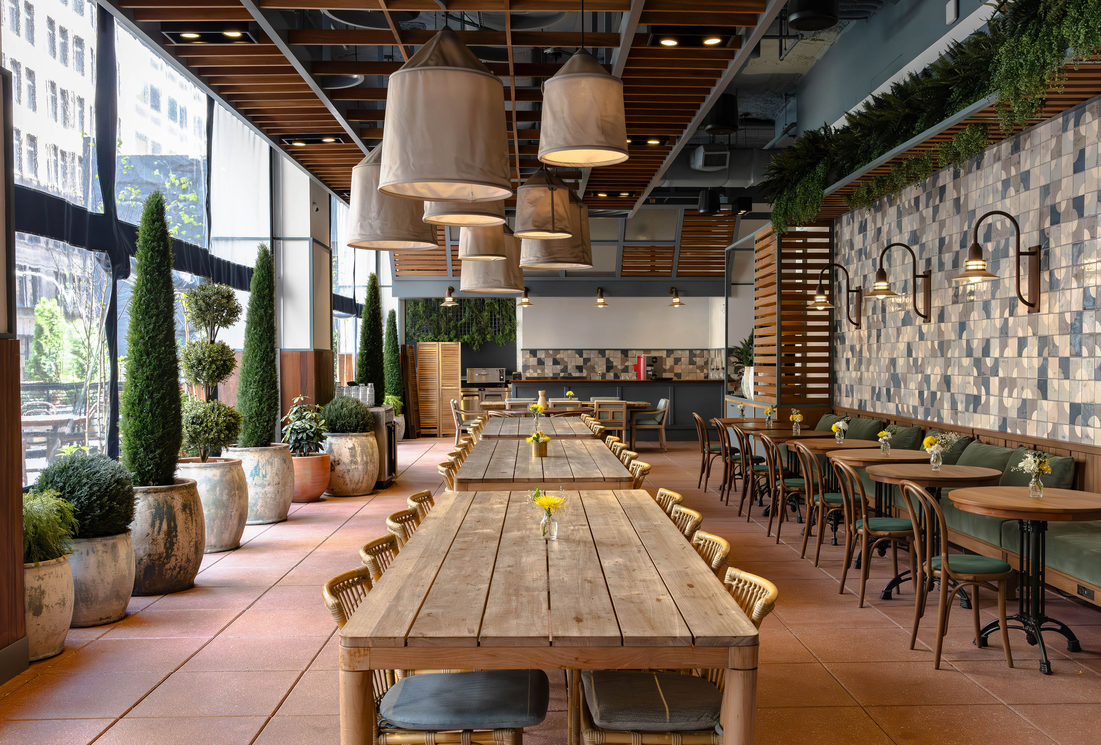 a wooden bench sitting in front of a building