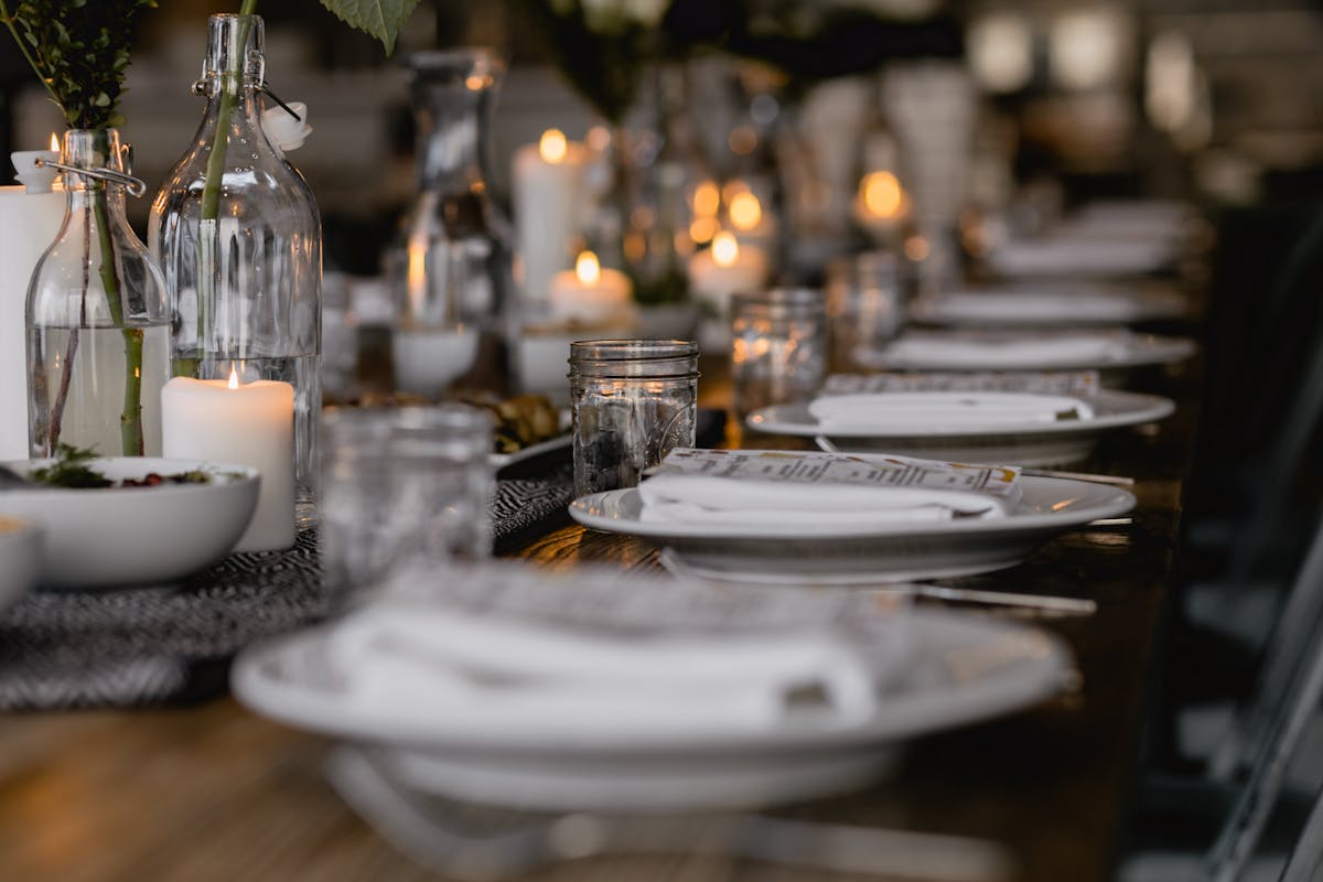 a dining table filled with wine glasses
