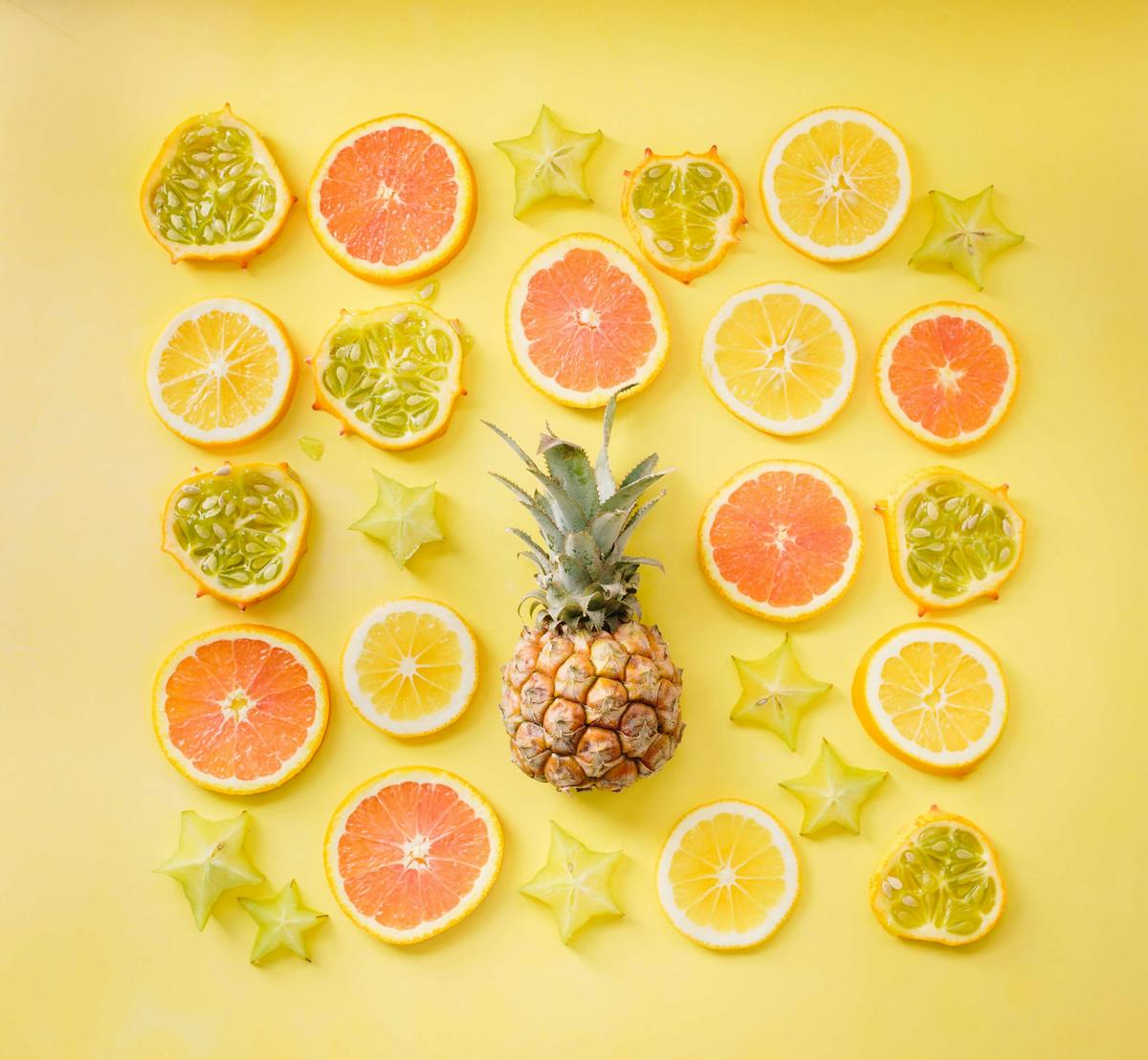 a group of oranges on a plate
