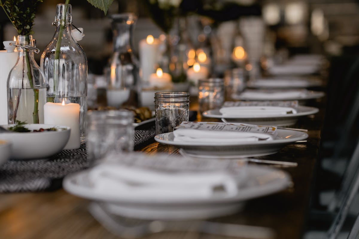 a dining table filled with wine glasses