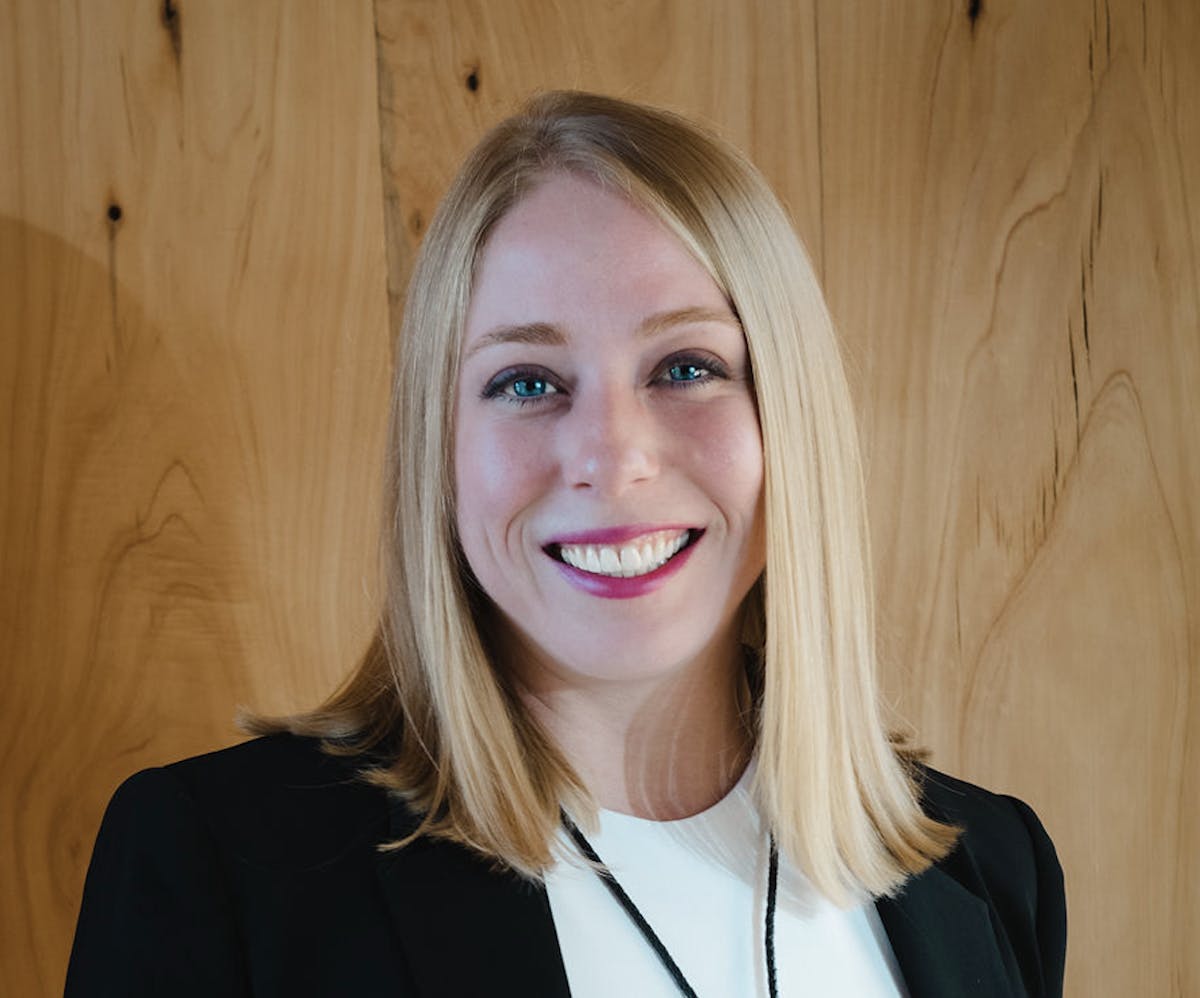 a woman smiling for the camera