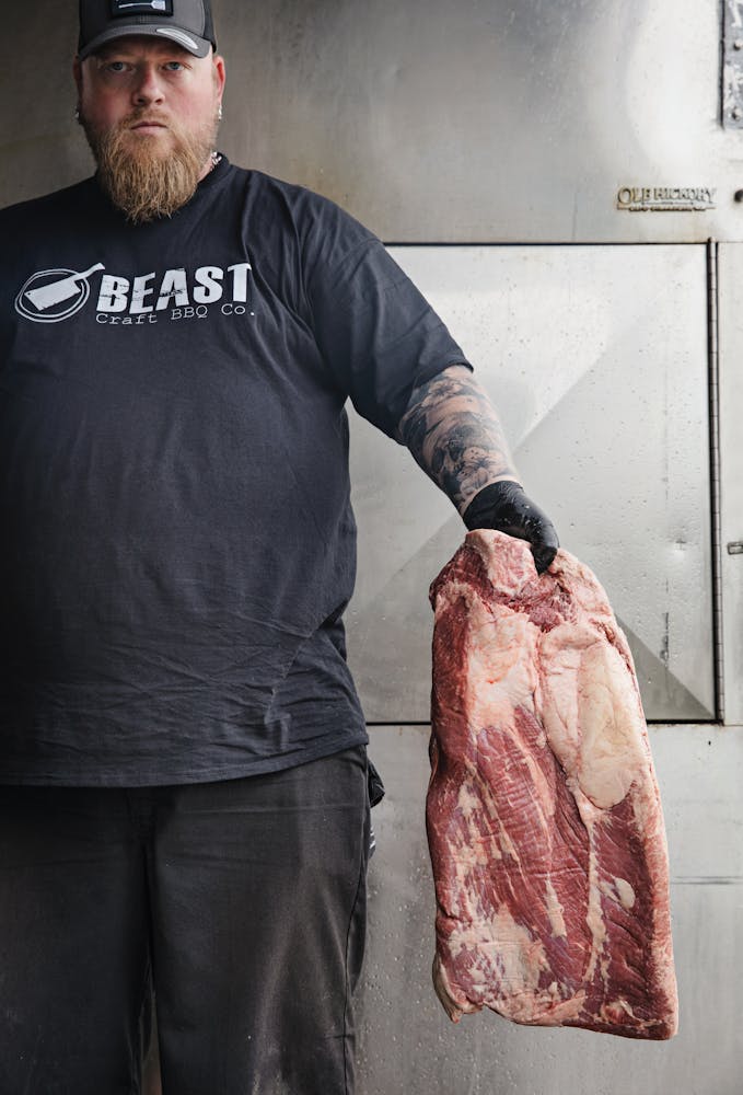 a man holding a fish