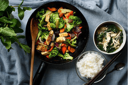 a rice bowl with vegetables