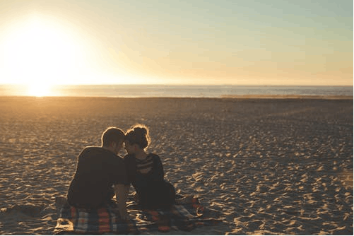 a couple on a romantic beach date