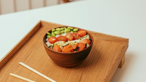 Tomatoes and beans on a rice bowl