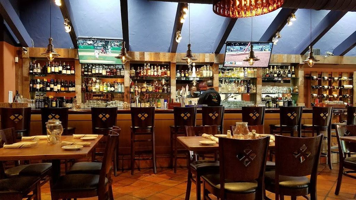 a dining room table in front of a store