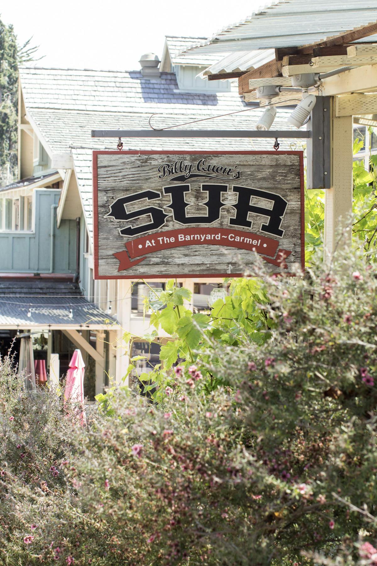 a sign in front of a building