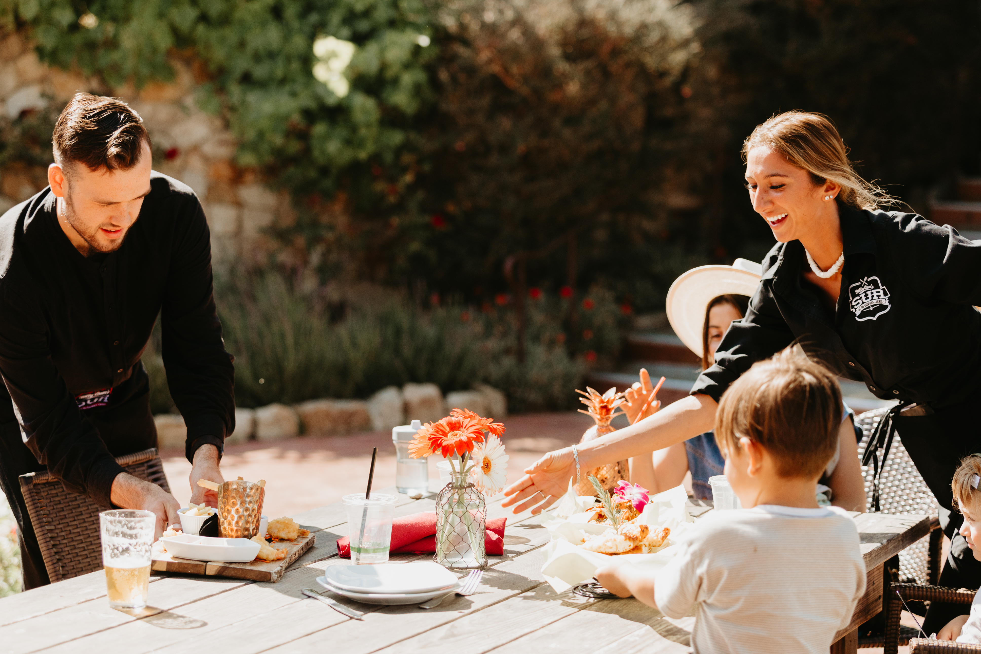 a group of people sitting at a table