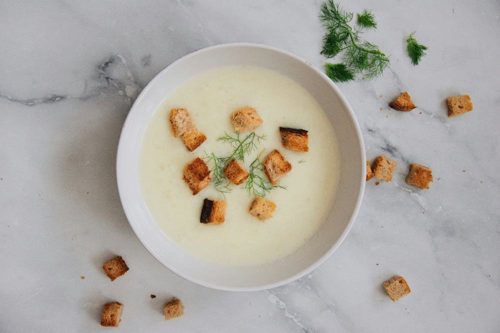Soup with herb garnishing 