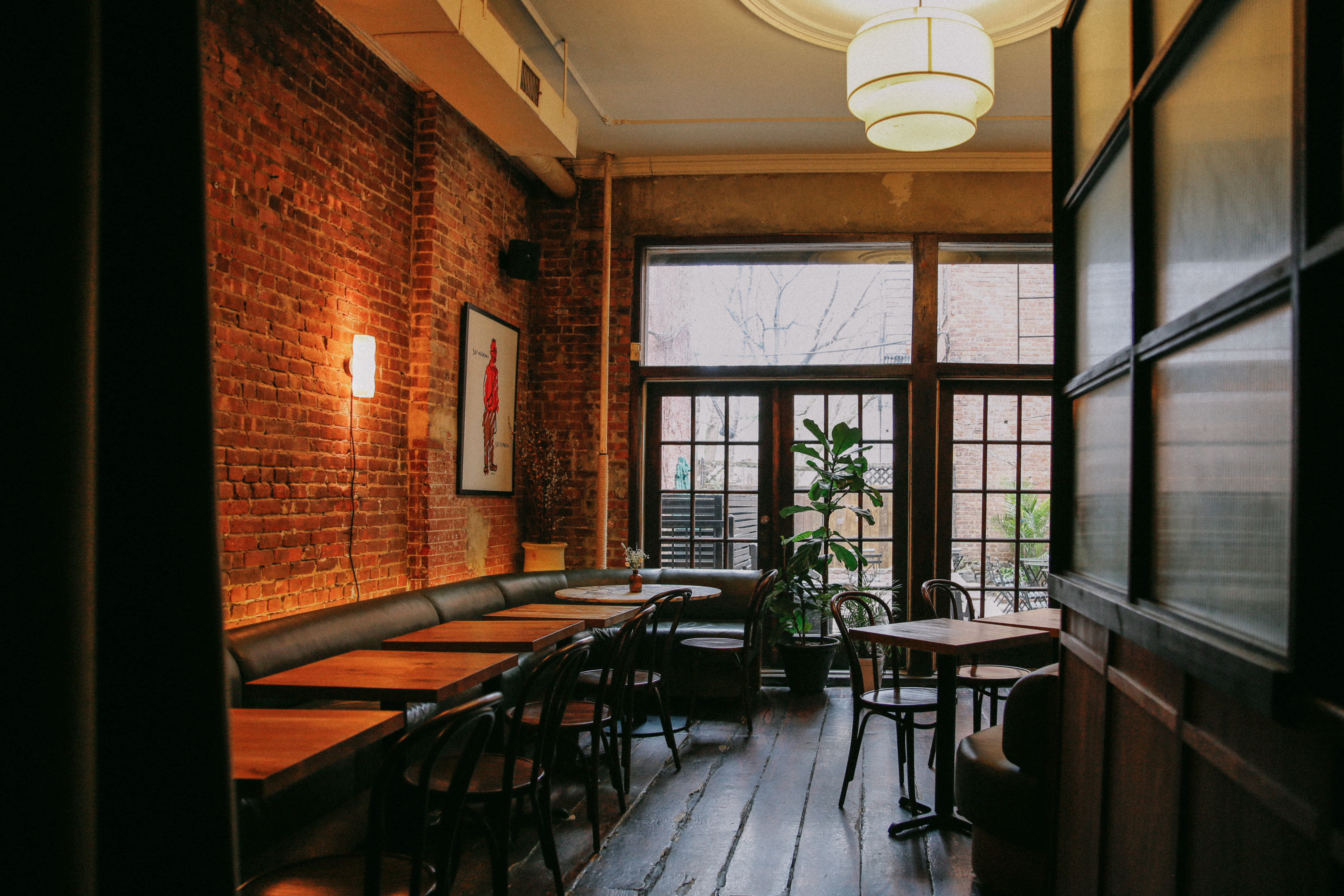 a room filled with furniture and a large window