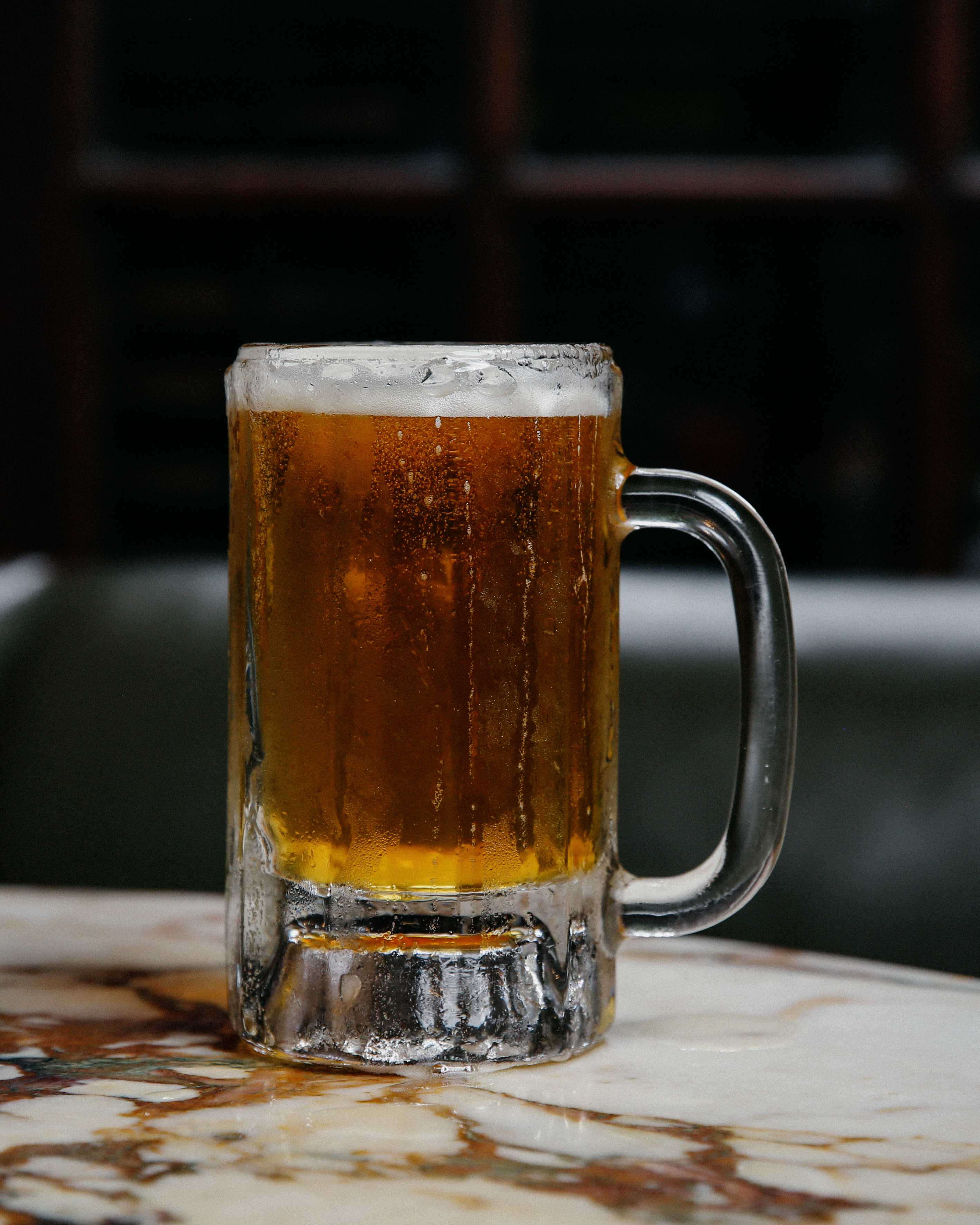 a glass mug on a table
