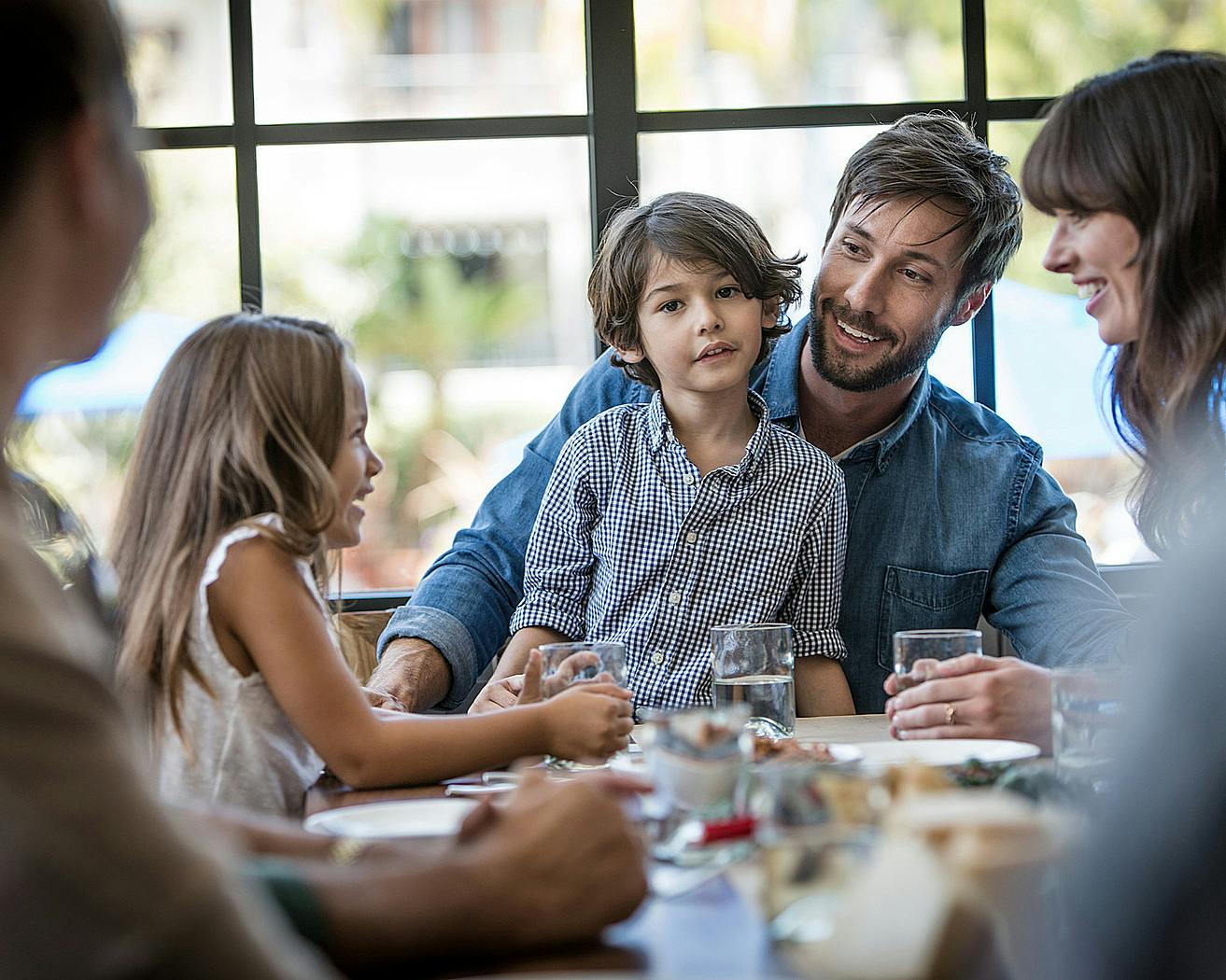 a group of people sitting at a table