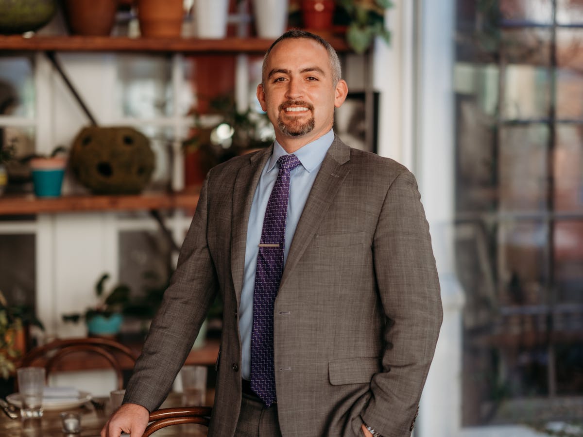 a man wearing a suit and tie