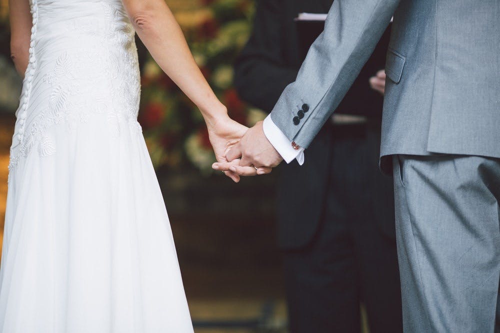 a person wearing a wedding dress