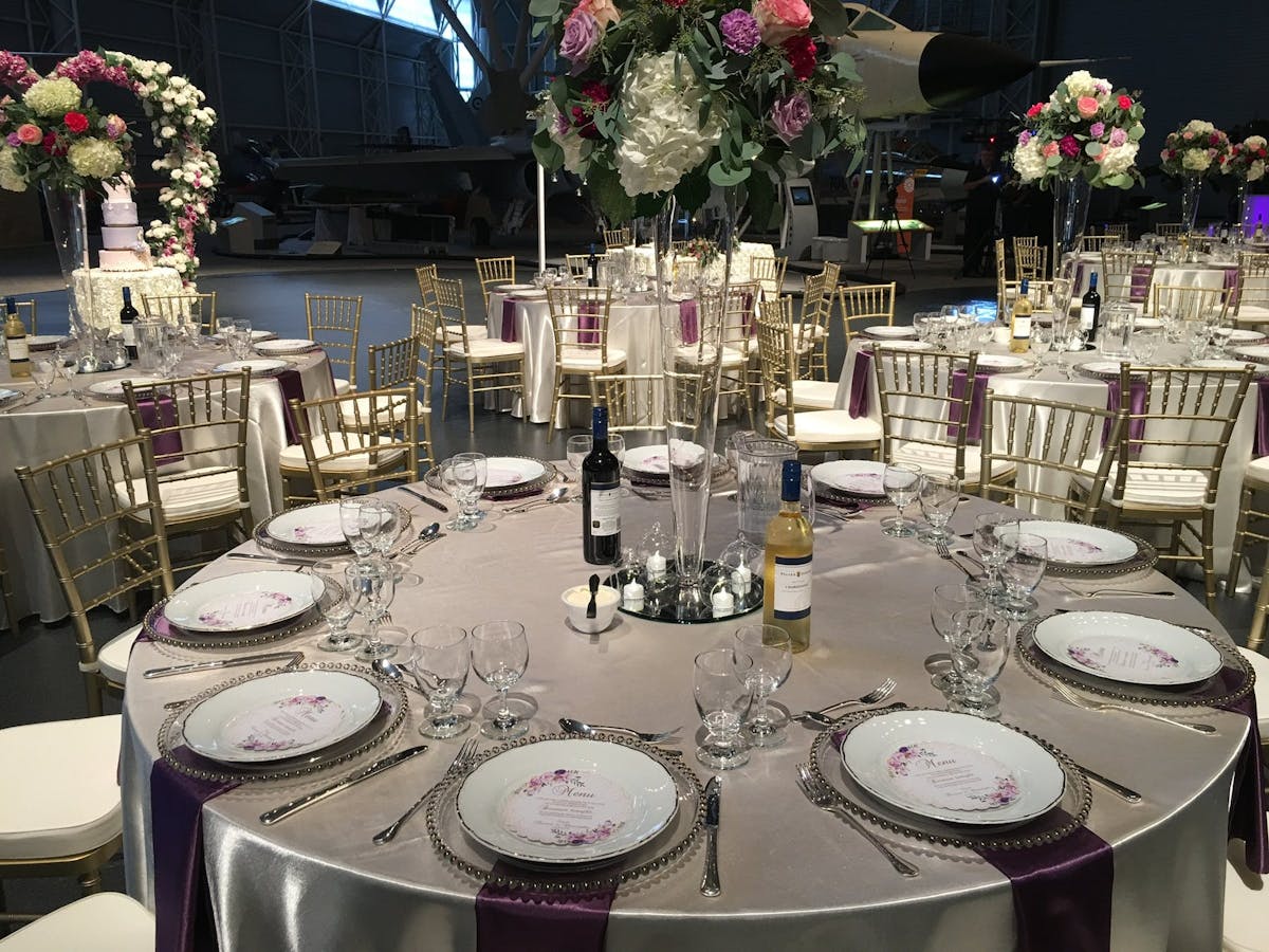 a dining table with a cake