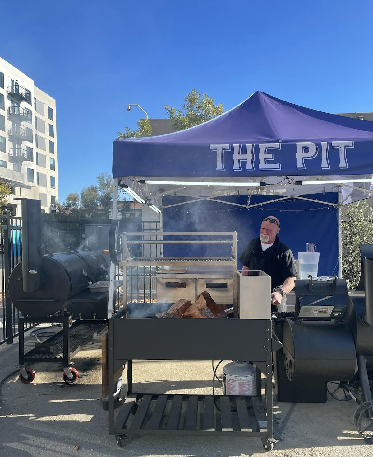 a person sitting in front of a building